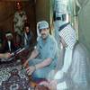 مخيم رفحا النموذجي، الذي أعددناه شمالي المملكة لاستيعاب 25 ألفاً من اللاجئين المدنيين العراقيين. وتبين هذه الصورة لقاءً تم بيني وبين الشيخ حسين علي الشعلان، إحدى الشخصيات البارزة في المعسكر